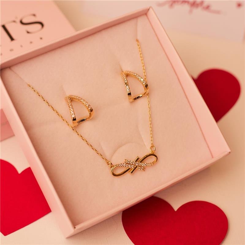 BRINCO VIVI V INVERTIDO CRAVEJADO BANHADO A OURO 18K