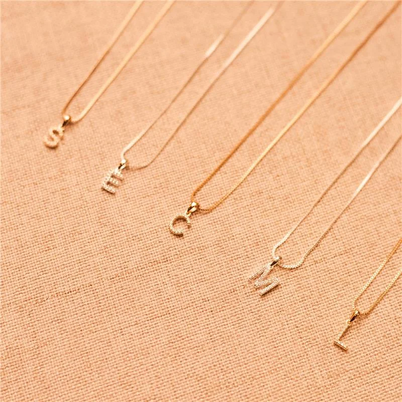 COLAR LETRA CRAVEJADA BANHADO A OURO