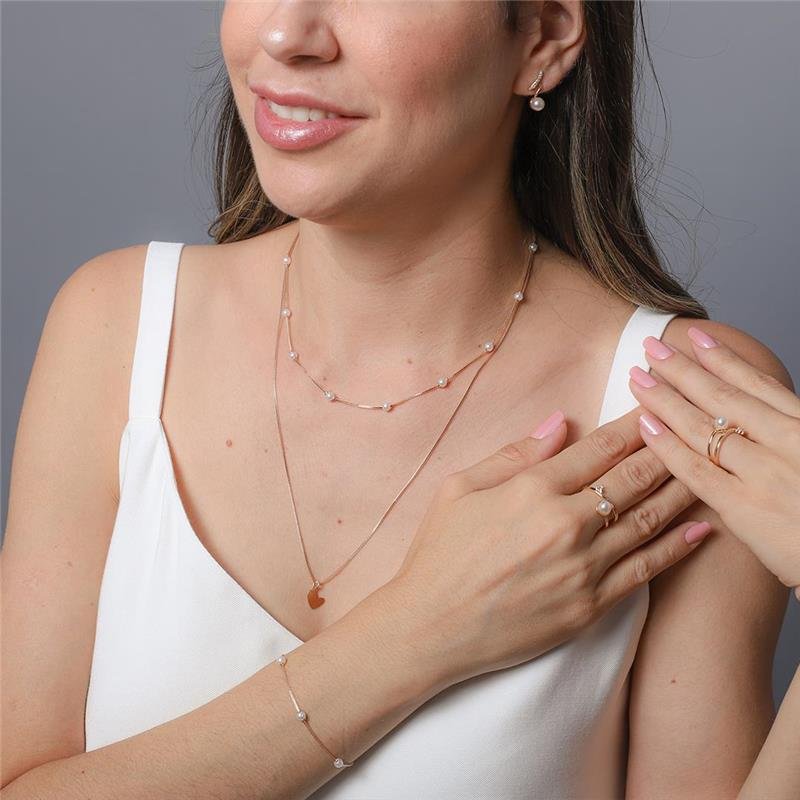 ANEL ALICE PÉROLA COM PONTO DE ZIRCÔNIA BANHADO A OURO 18K