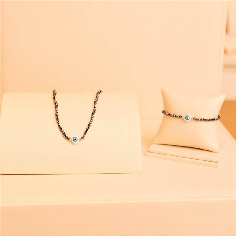 PULSEIRA CRISTAIS AZUIS COM OLHO GREGO BANHADO A OURO 18K