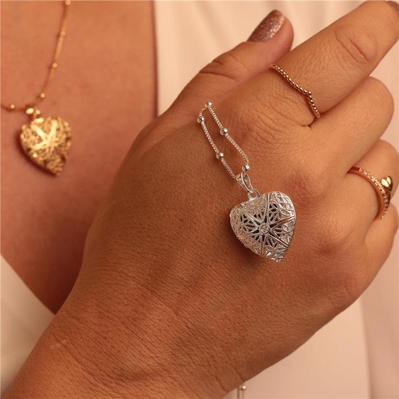 PINGENTE RELICÁRIO CORAÇÃO VAZADO BANHADO A PRATA