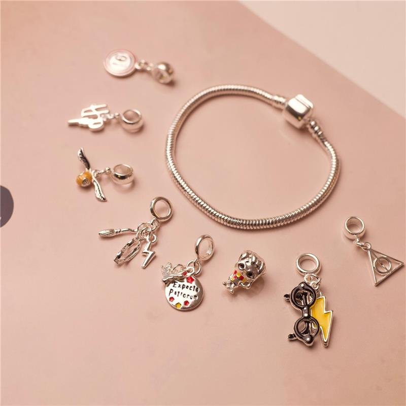 BERLOQUE PENDENTE RELIQUIAS DA MORTE BANHADO A PRATA